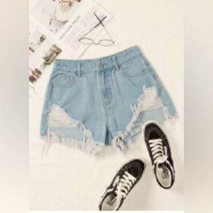 Ripped raw trim denim shorts